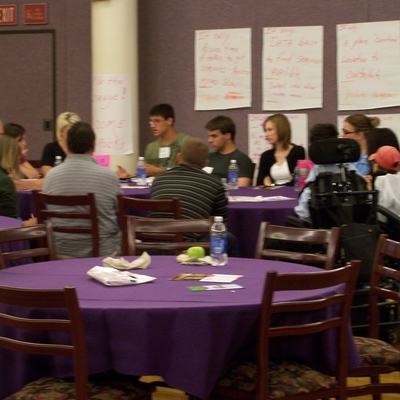 Persons with disabilities at planning event to improve services for youth with disabilities.