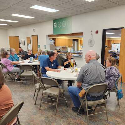 Gathering around the table.