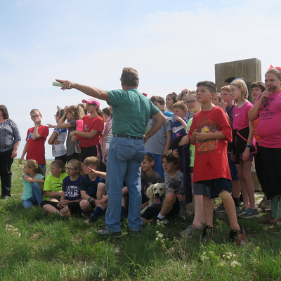 Prairie Guard Dan Wagner tells the stories of Mount Mitchell to schoolchildren
