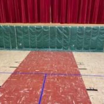 These stage/gym mats would be replaced with the 2023 proceeds.